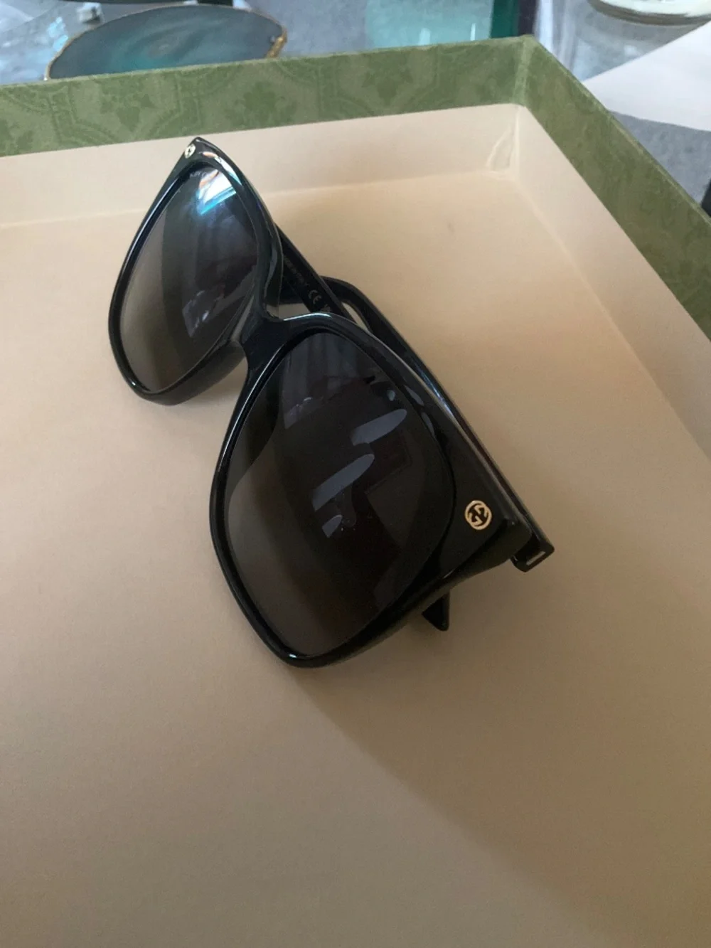 GUCCI GG0022S Women's Cateye Sunglasses Black Gold Logo/Grey Smoke Gradient 57mm